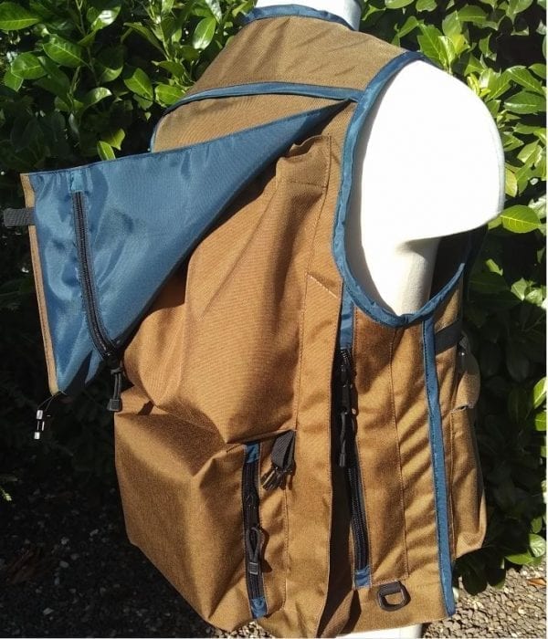 Image of The Side of A Klamath Extreme Cruiser Vest In Coyote Tan With Blue Binding