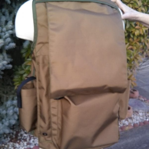 Image of the Back of A Rogue Extreme Cruiser Vest In Coyote with Forest Green Binding