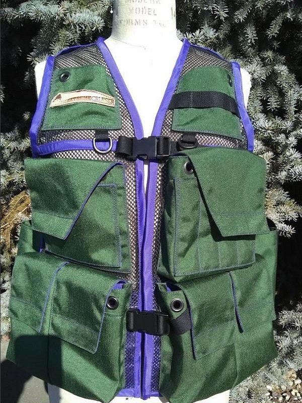 Image of A Woman's Siskiyou Extreme Cruiser Vest In Forest Green With Purple Binding