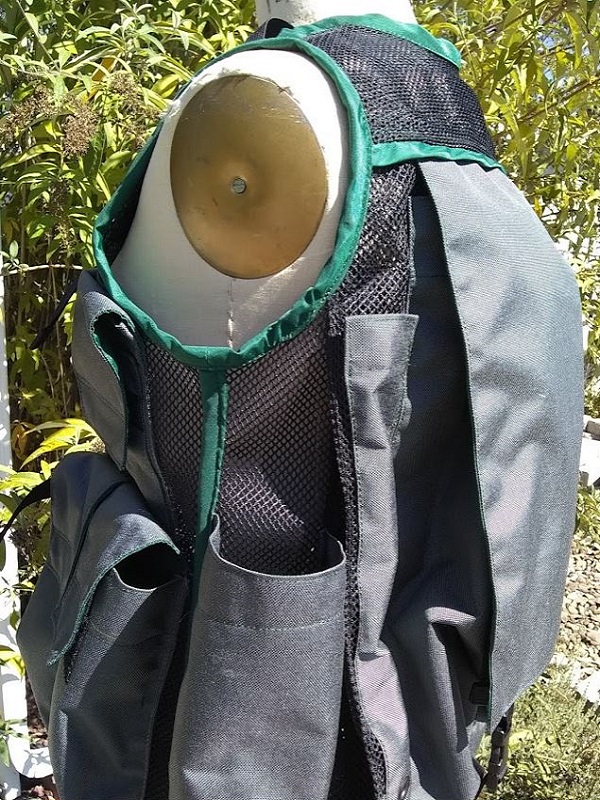 Image of The Side of A Woman's Siskiyou Cruiser Vest in Grey with Forest Green Binding