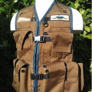 An Image of The Klamath Cruiser Vest In Coyote Tan With Navy Blue Binding