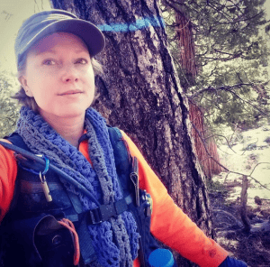 Image of Woman In Forest Wearing An Extreme Cruiser Vest