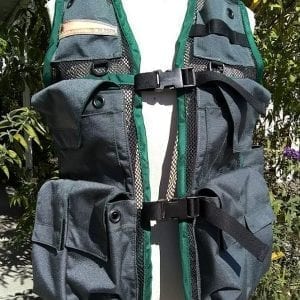 Image of a Woman's Siskiyou Extreme Cruiser Vest In Grey with Forest Green Binding