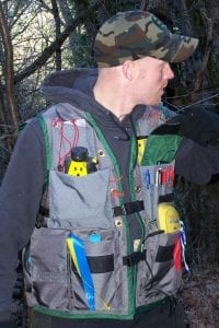 Close Up Image of Man Wearing A Fully Loaded Extreme Cruiser Vest